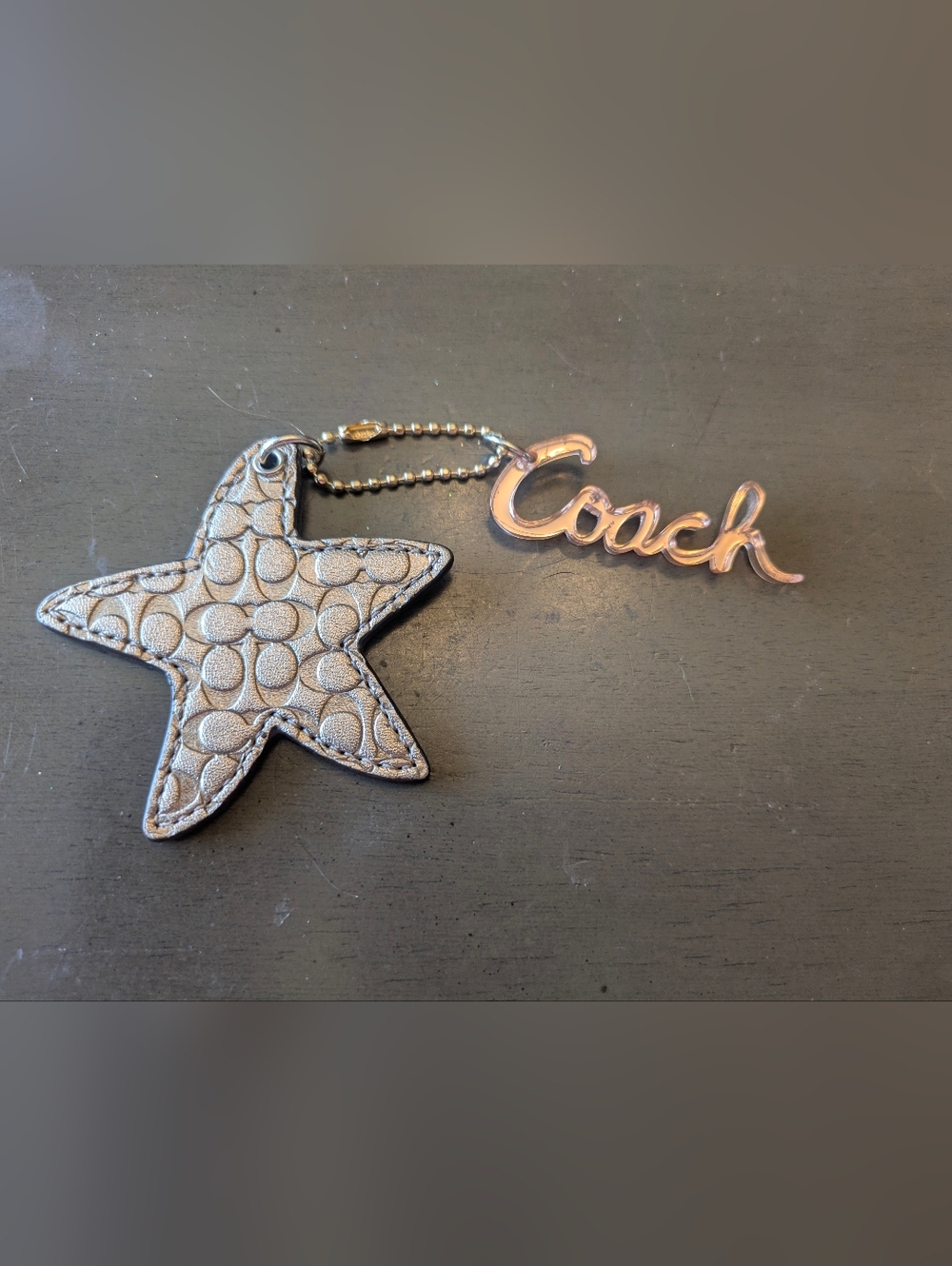 Coach Metallic Gold Starfish  Keychain with Coach  gold script Tag